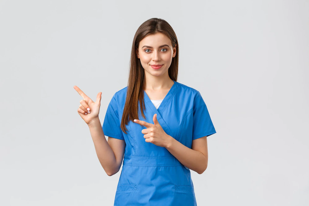 Nurse pointing and The Benefits of Working with a Healthcare Staffing Agency for Hospitals